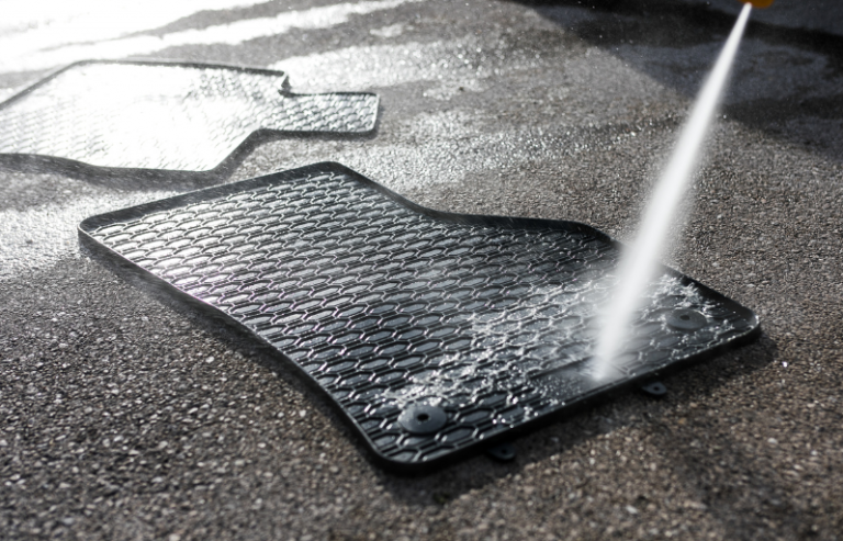 Cleaning car floor mats